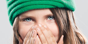 Girl Covering Cold Sore - Parents Canada