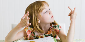 Girl Doing Homework - Parents Canada