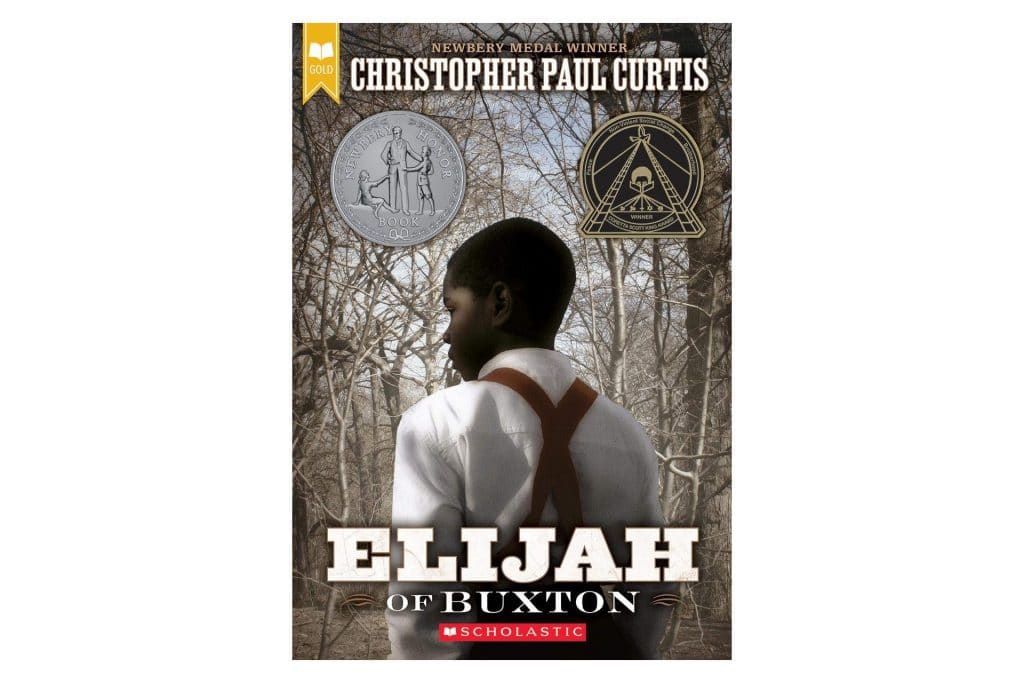 Book cover of a Black boy in the woods, the title says Elijah of Buxton