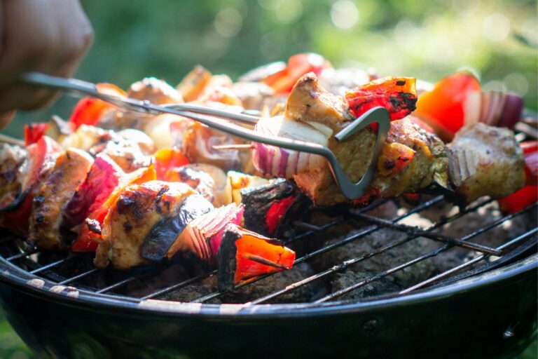 skewers grilling on a barbecue